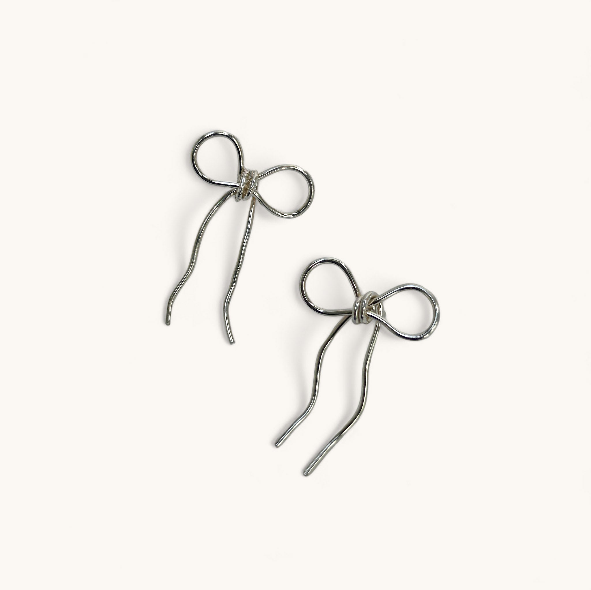 Jennifer Loiselle silver wire bow ribbon earrings