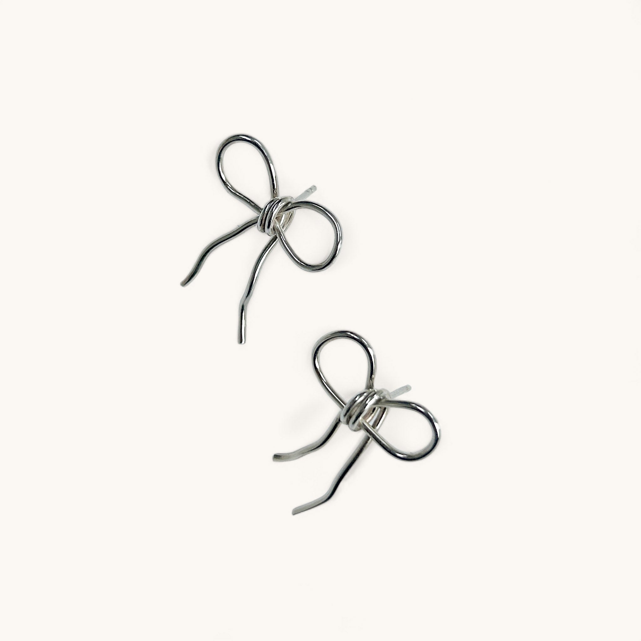 Jennifer Loiselle recycled silver ribbon bow earrings