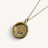 Jennifer Loiselle four leaf clover necklace in recycled silver and gold