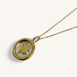 Jennifer Loiselle four leaf clover necklace in recycled silver and gold