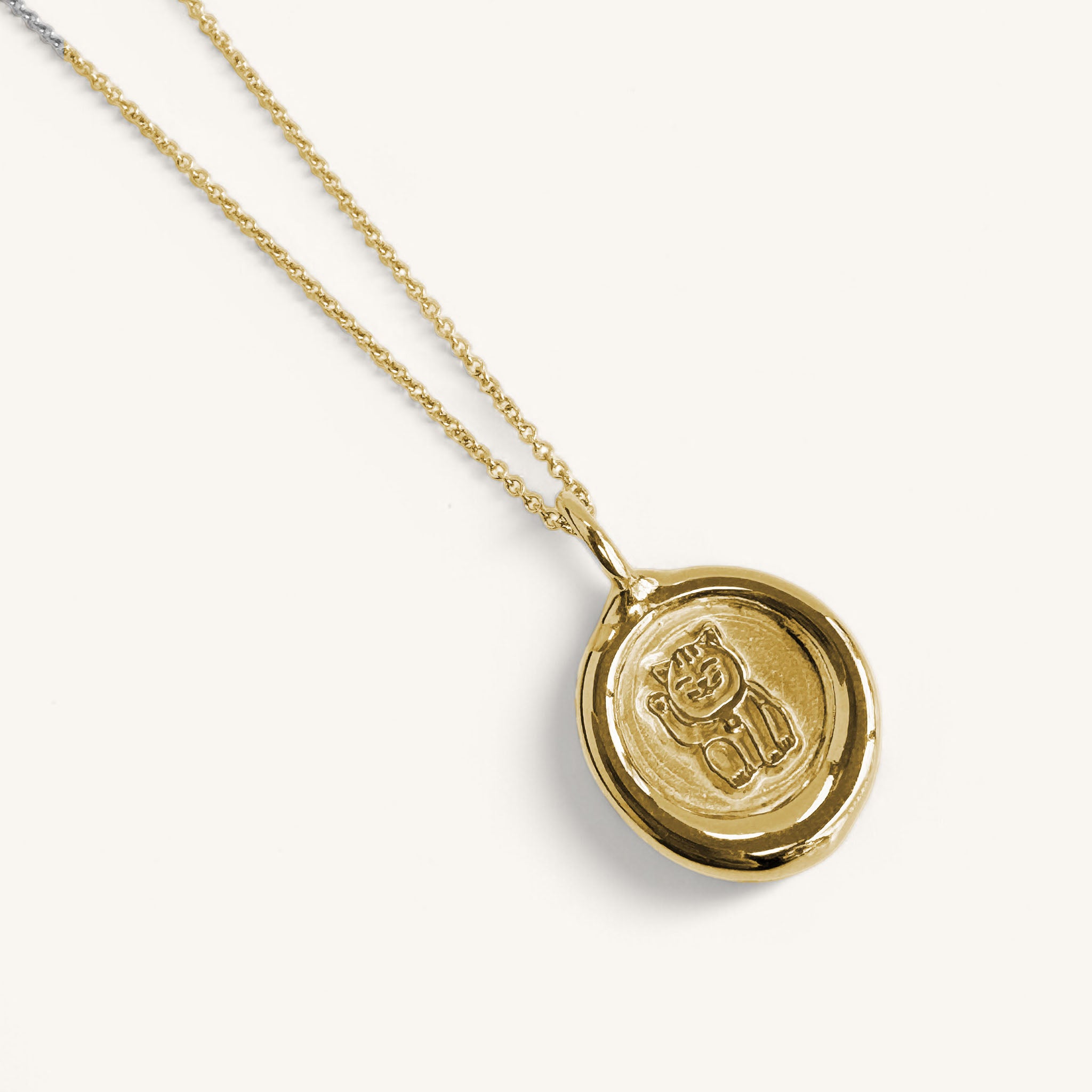 Jennifer Loiselle Lucky Cat Necklace in silver and gold vermeil