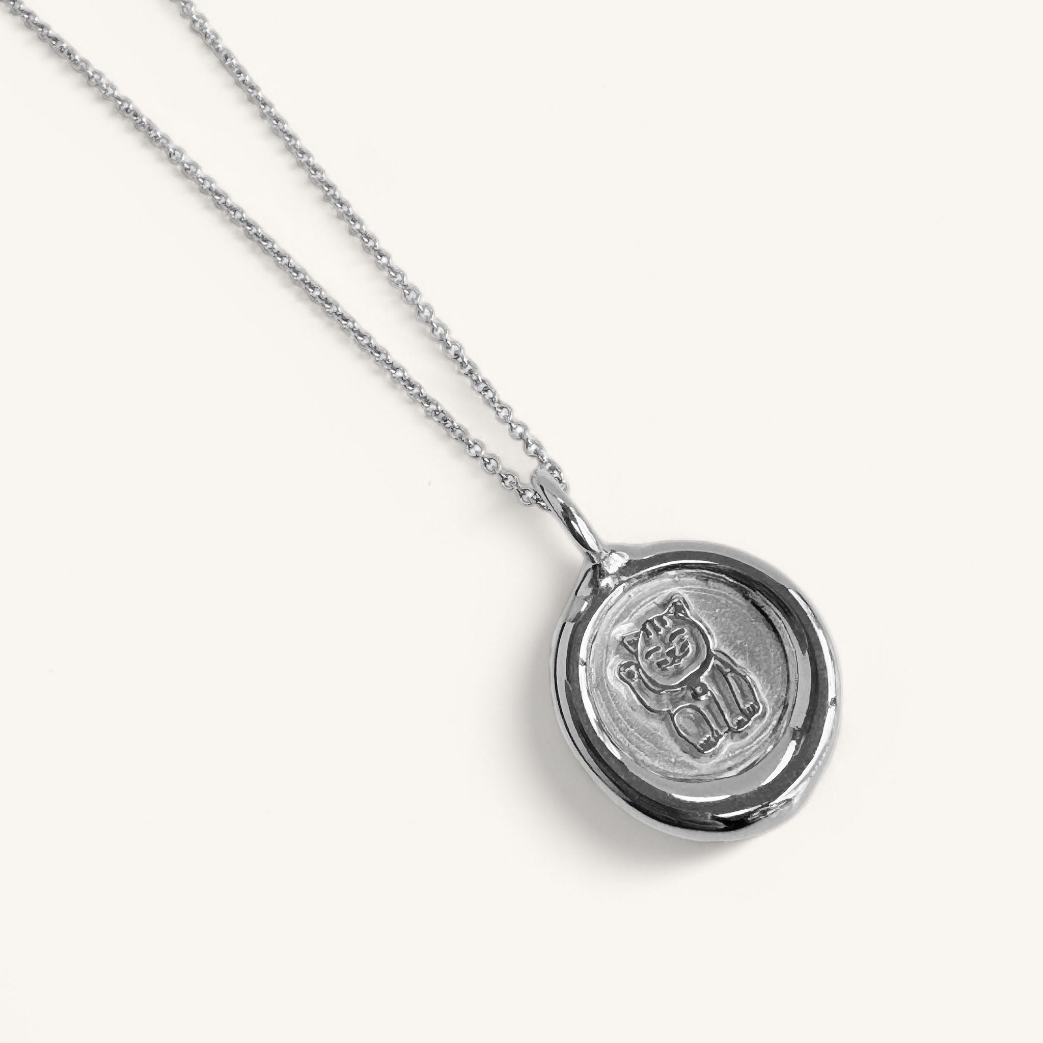 Jennifer Loiselle Lucky Cat Necklace in silver and gold vermeil