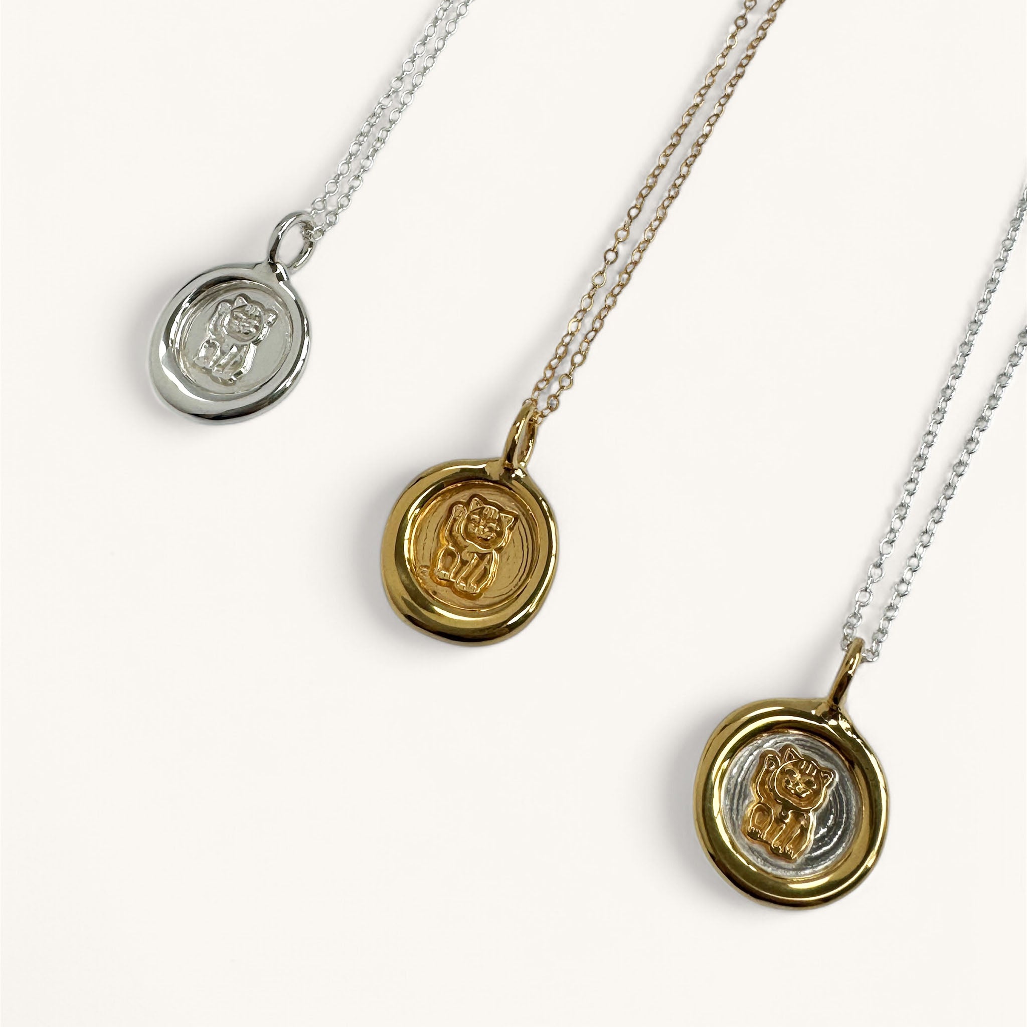 Jennifer Loiselle Lucky Cat Necklace in silver and gold vermeil