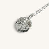 Jennifer Loiselle stamped star silver and gold vermeil pendant