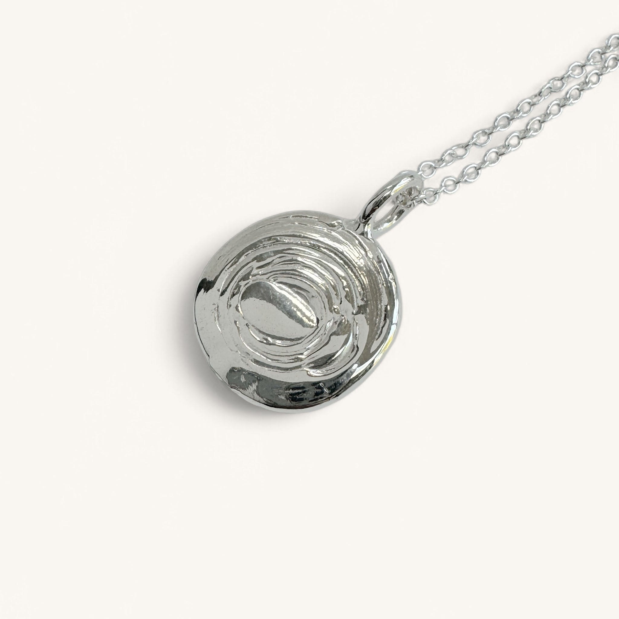 Jennifer Loiselle stamped star silver and gold vermeil pendant