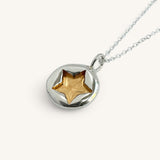Jennifer Loiselle stamped star silver and gold vermeil pendant