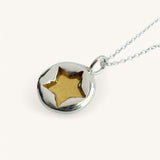 Jennifer Loiselle stamped star silver and gold vermeil pendant