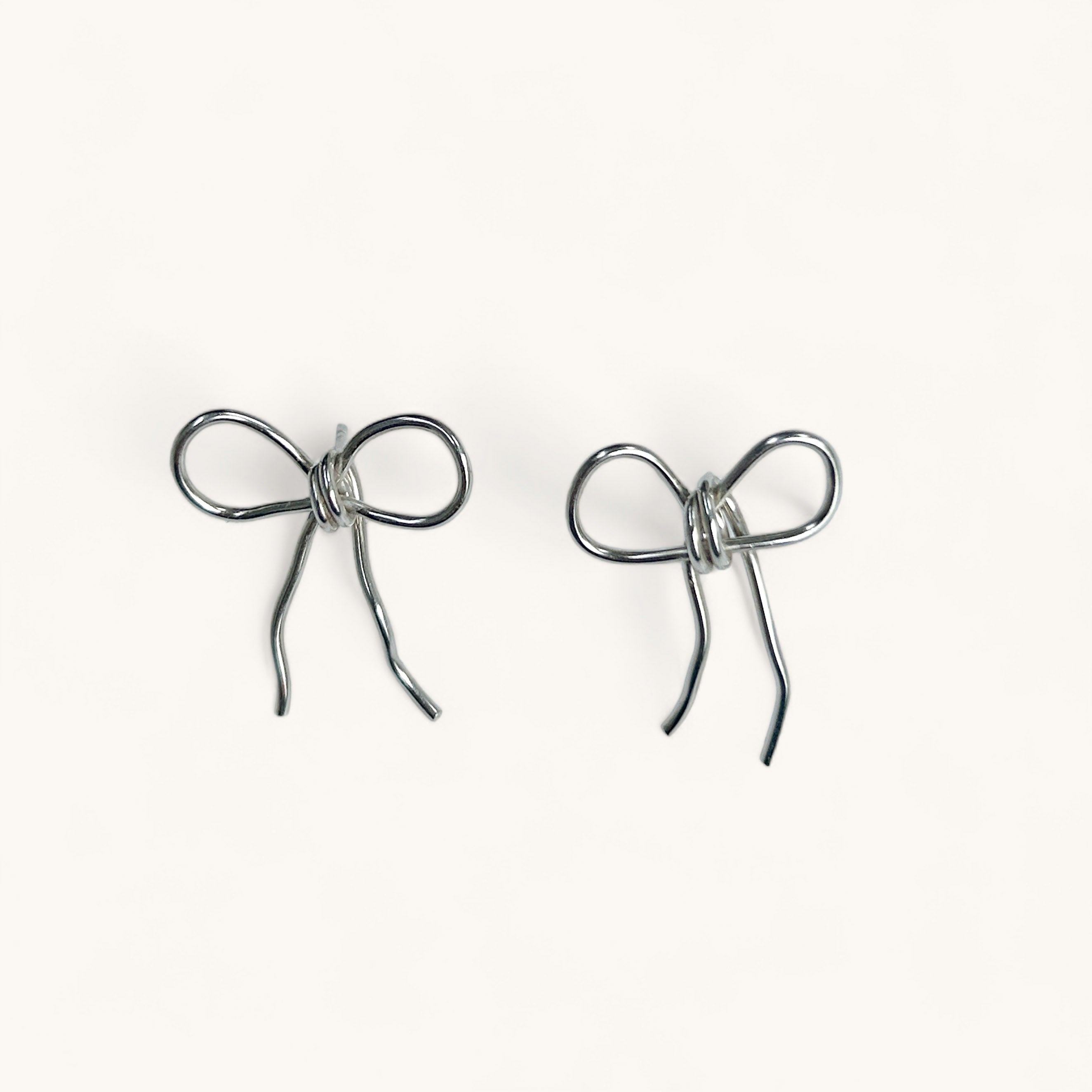 Jennifer Loiselle recycled silver ribbon bow earrings