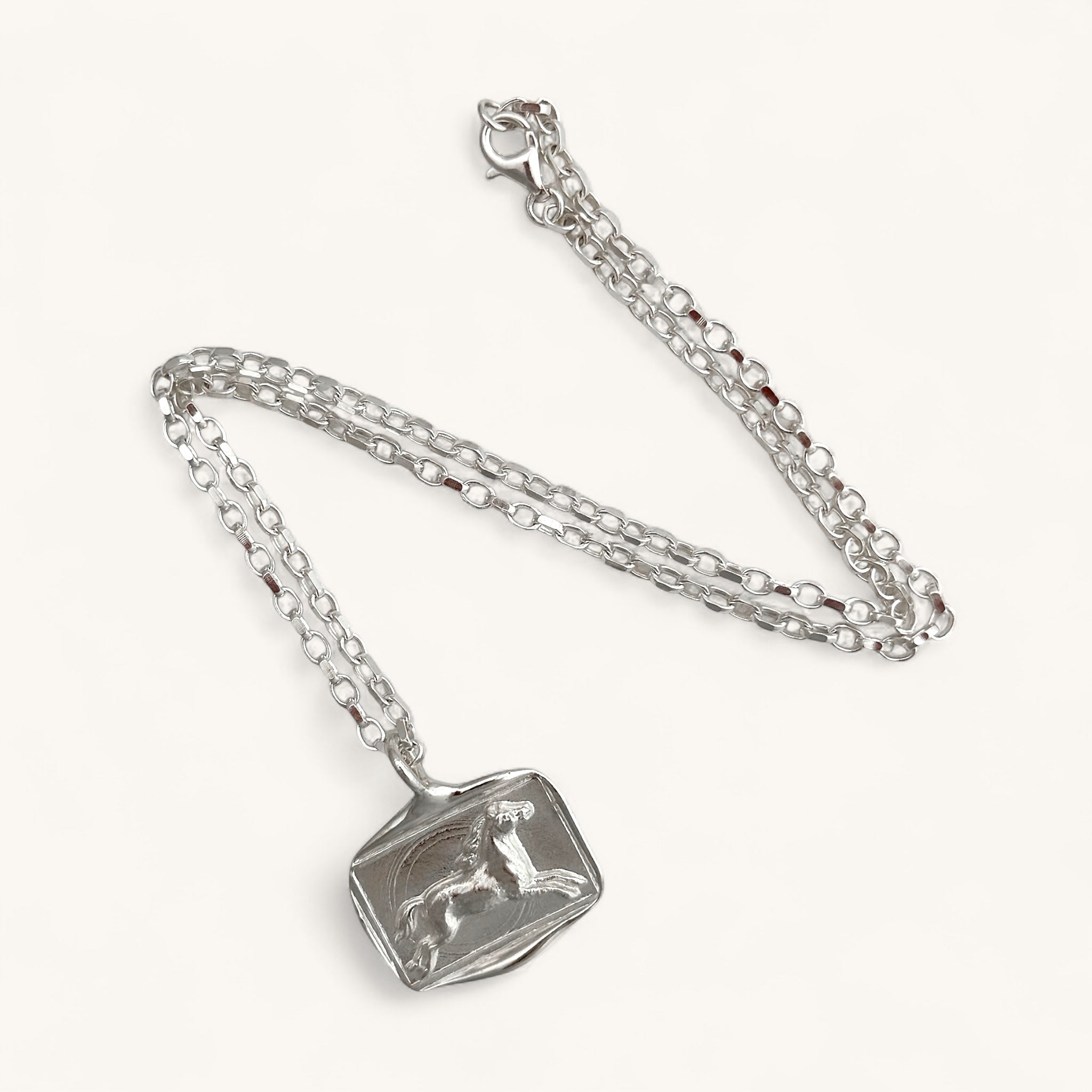 Jennifer Loiselle silver horse lost wax pendant on a belcher necklace