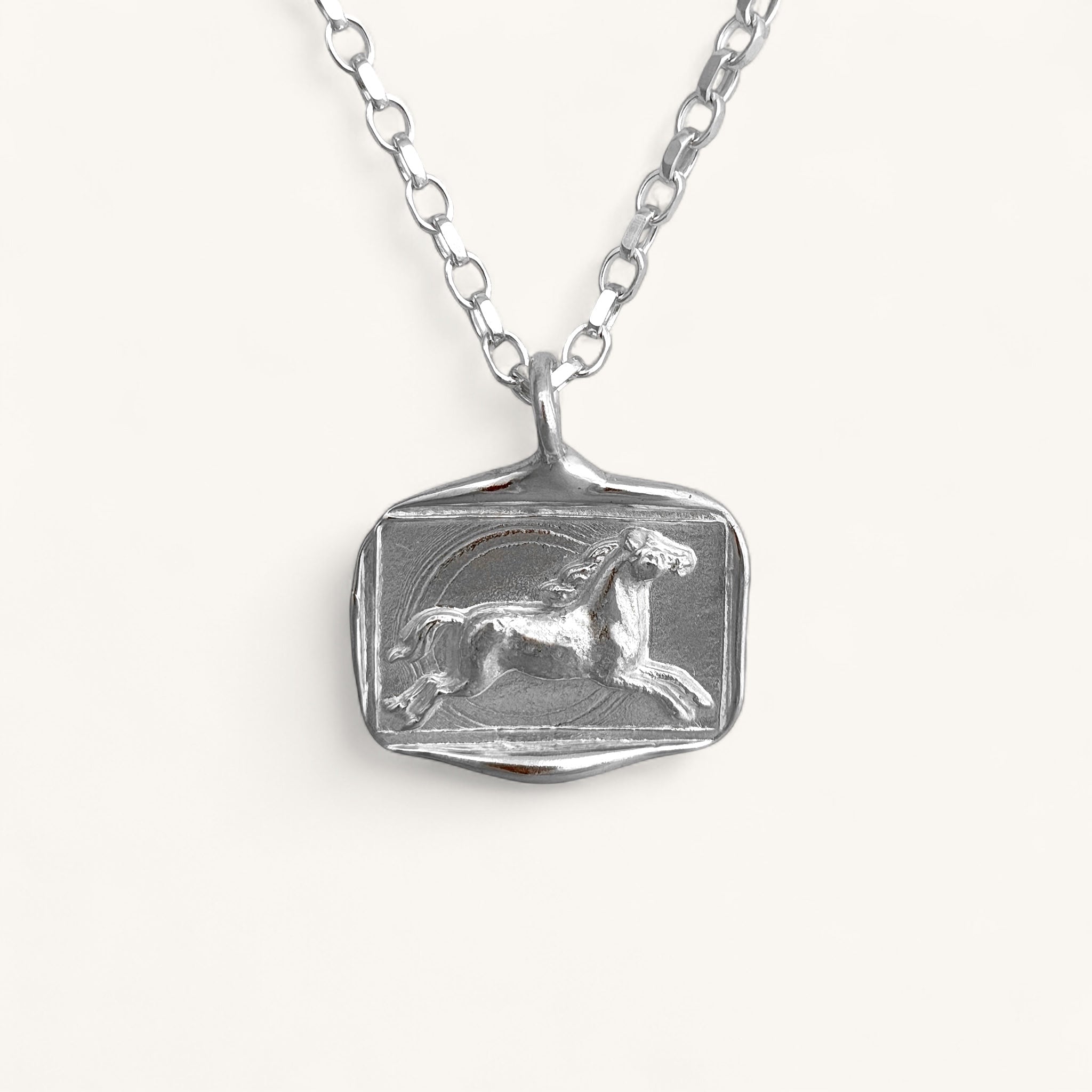 Jennifer Loiselle silver horse lost wax pendant on a belcher necklace