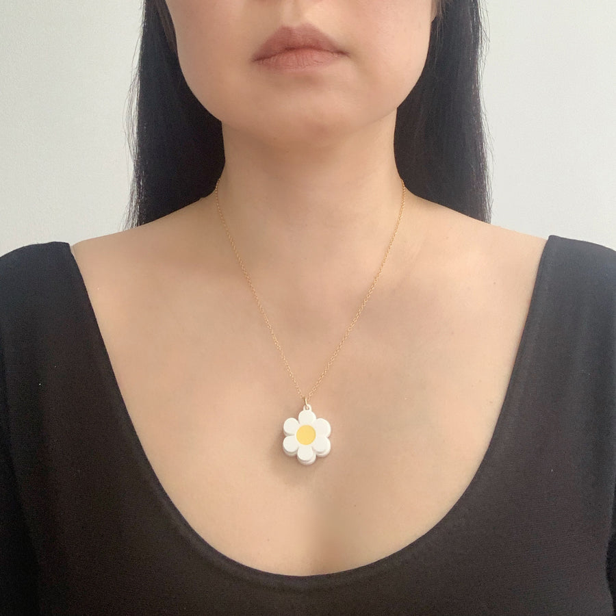 Jennifer Loiselle laser cut acrylic daisy charm pendant necklace
