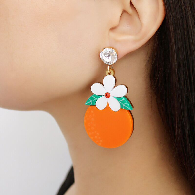 Jennifer Loiselle laser cut acrylic orange blossom fruit earrings